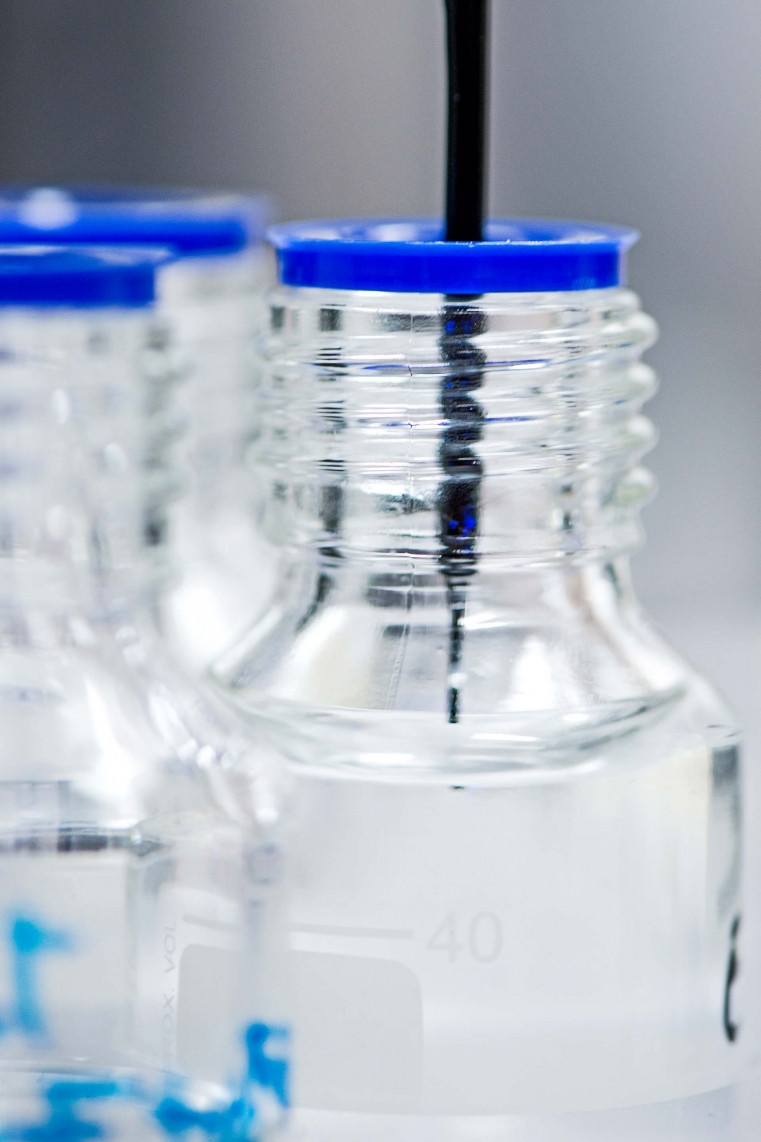 Pipette in Glascontainer.